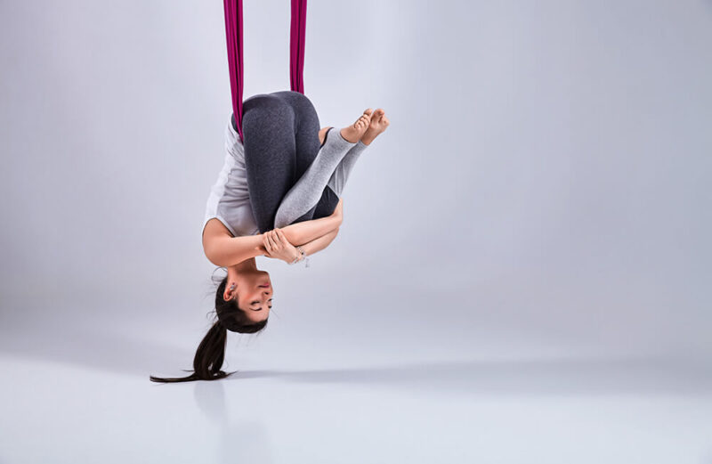 Lifting Off with Aerial Yoga: Definition, Benefits and Tips • Yoga